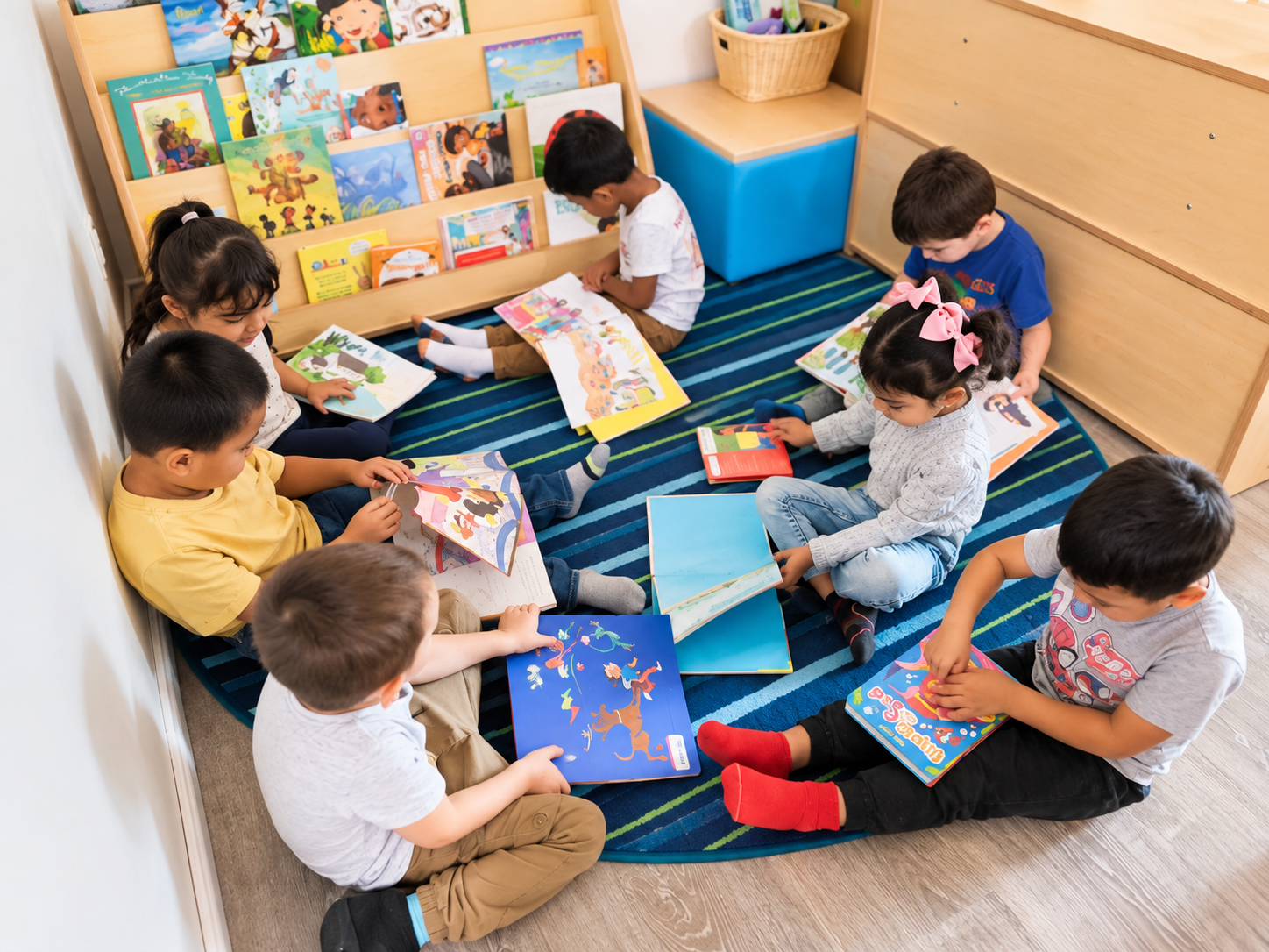 Preschool children enjoying books together